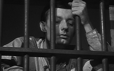 A Man Escaped  (1956) by Robert Bresson. This is the best prison